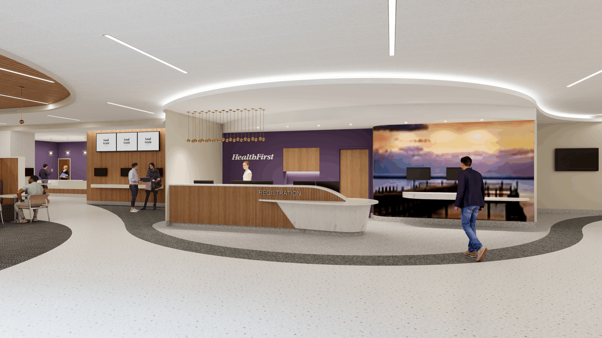 A lobby interior with wooden reception desk and a purple sunset backdrop behind it.