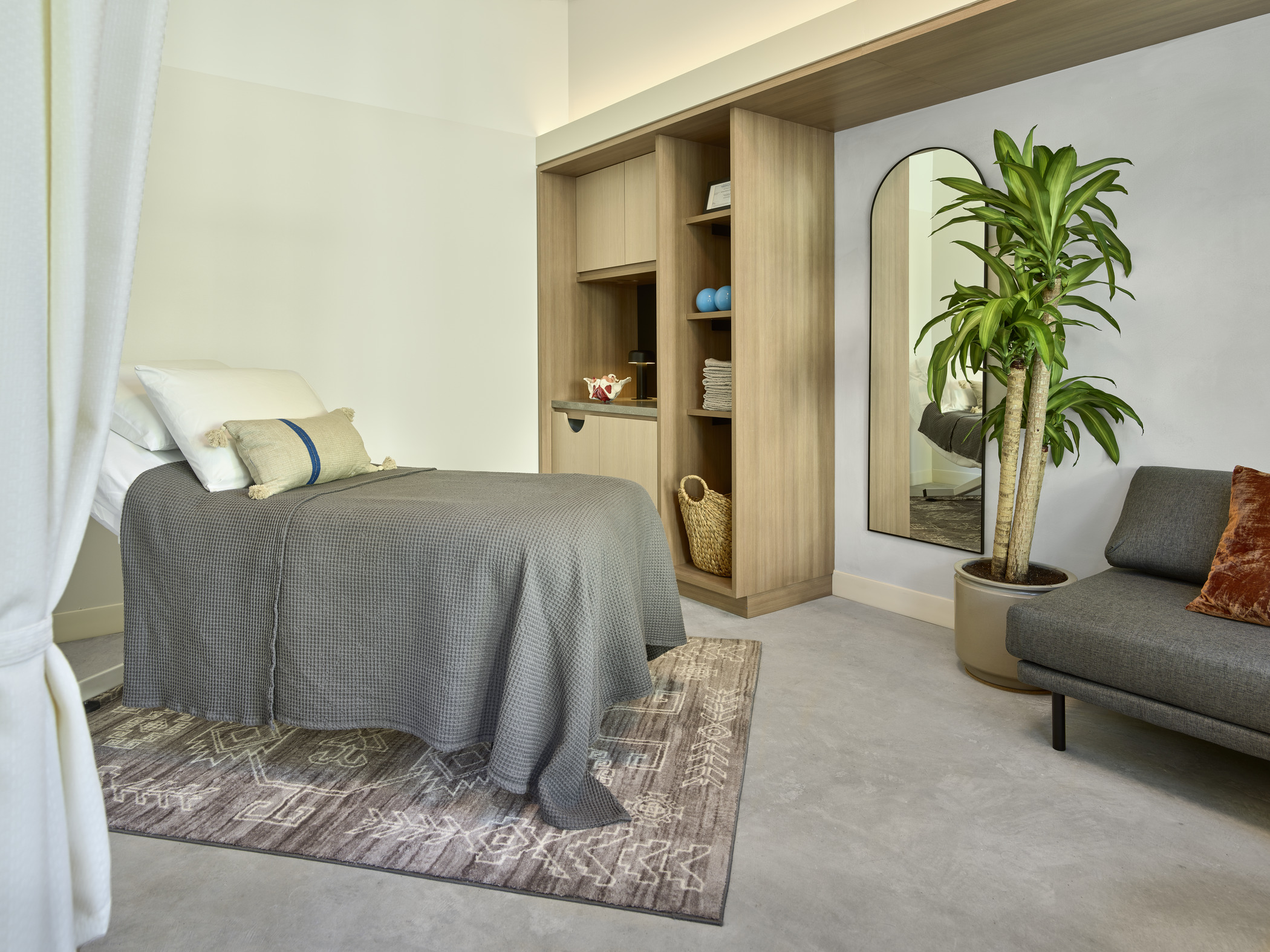 Home-inspired resting bed room at Indigo Physiotherapy