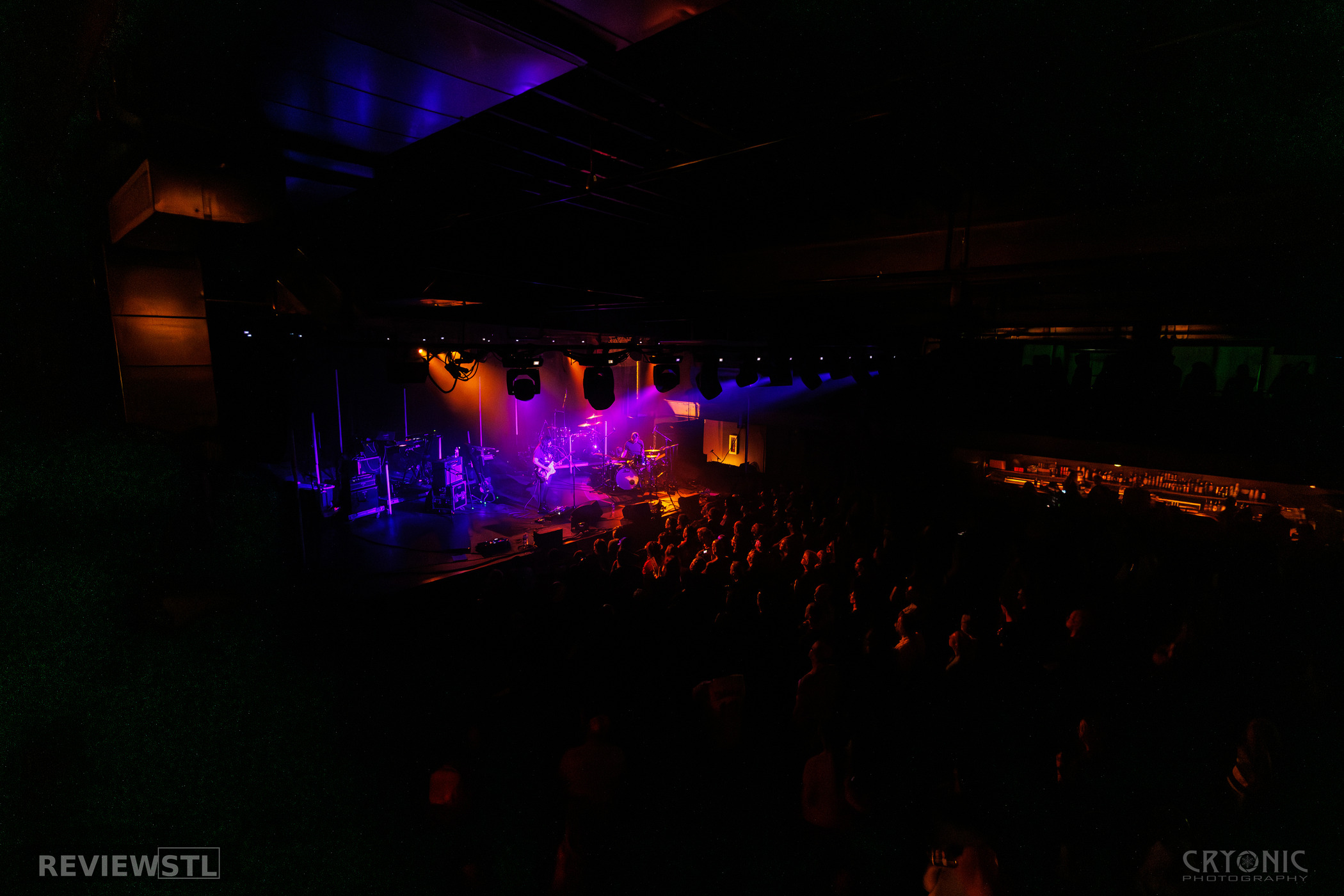 Live concert at The Sovereign in St. Louis with vibrant stage lighting and audience enjoying the performance.
