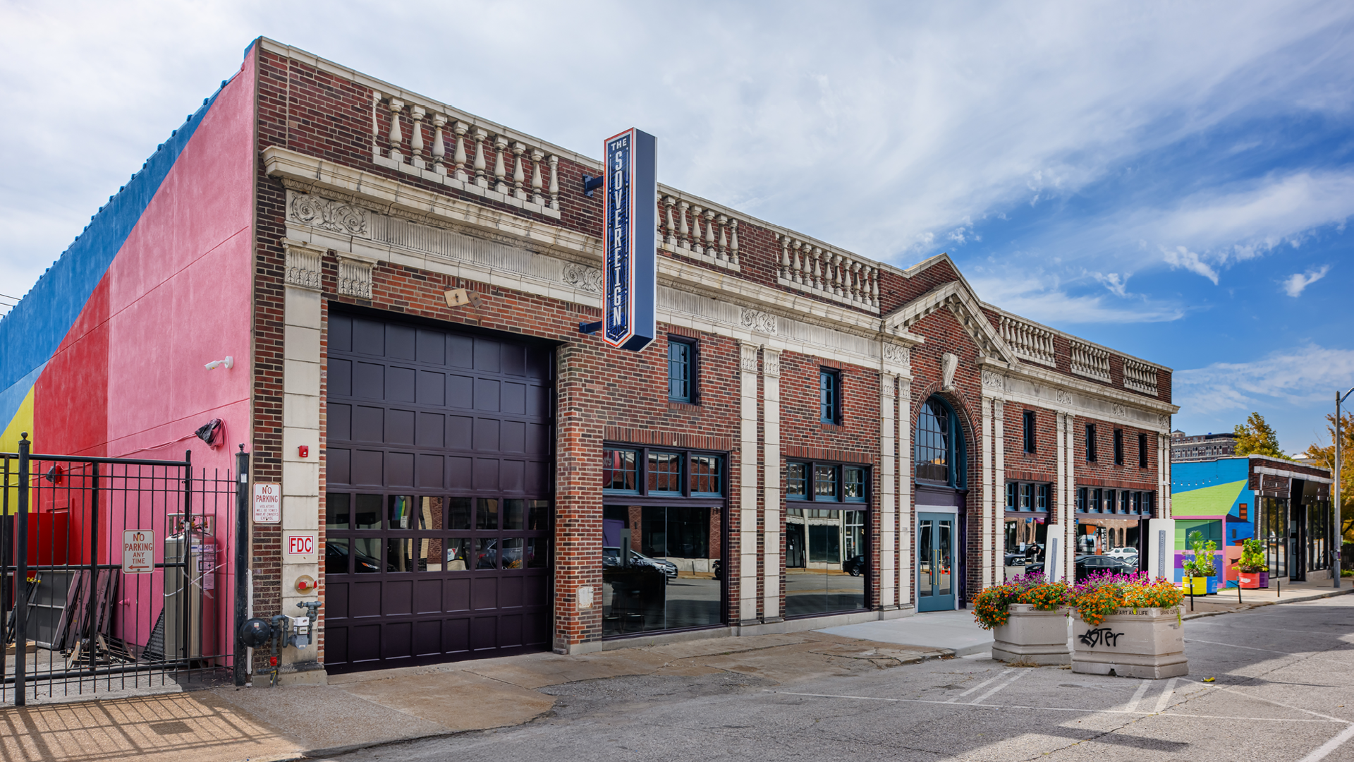 Exterior of The Sovereign concert venue in St. Louis featuring restored brick façade, arched entrance, and modern signage.